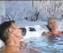 Couple relaxing in hot tub