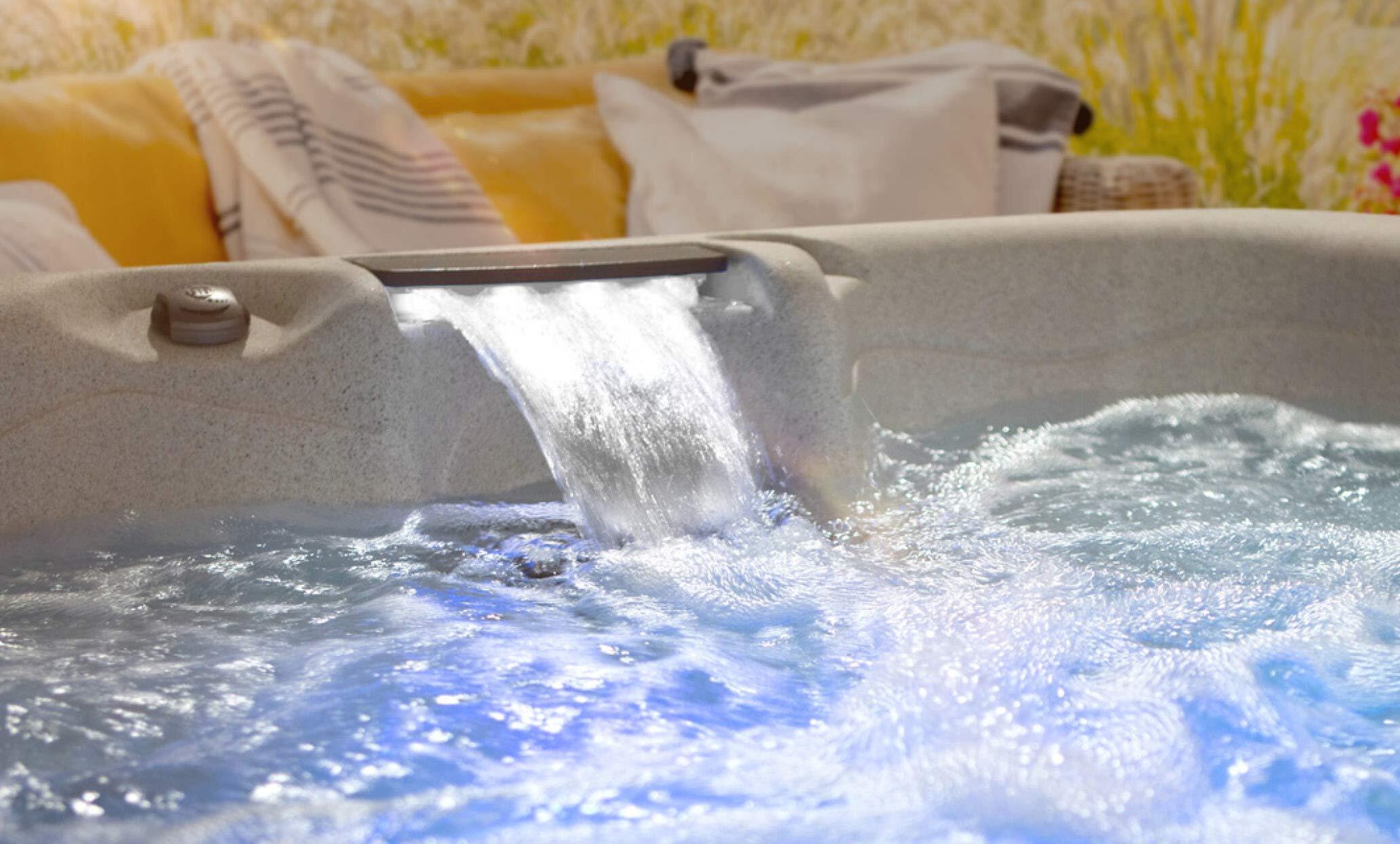 Waterfall water feature on a getaway hot tub
